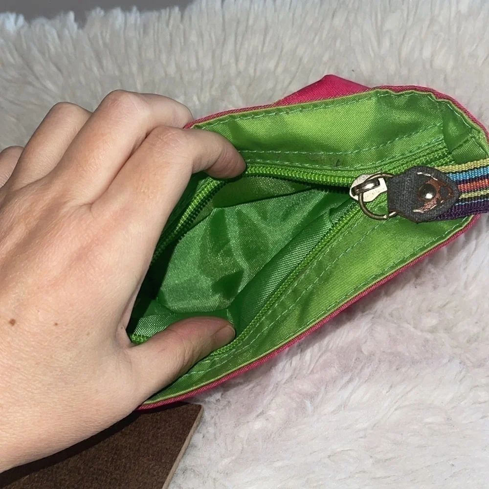 Pencil bag and 2 sample painting boards with Velcro stickers on the back .